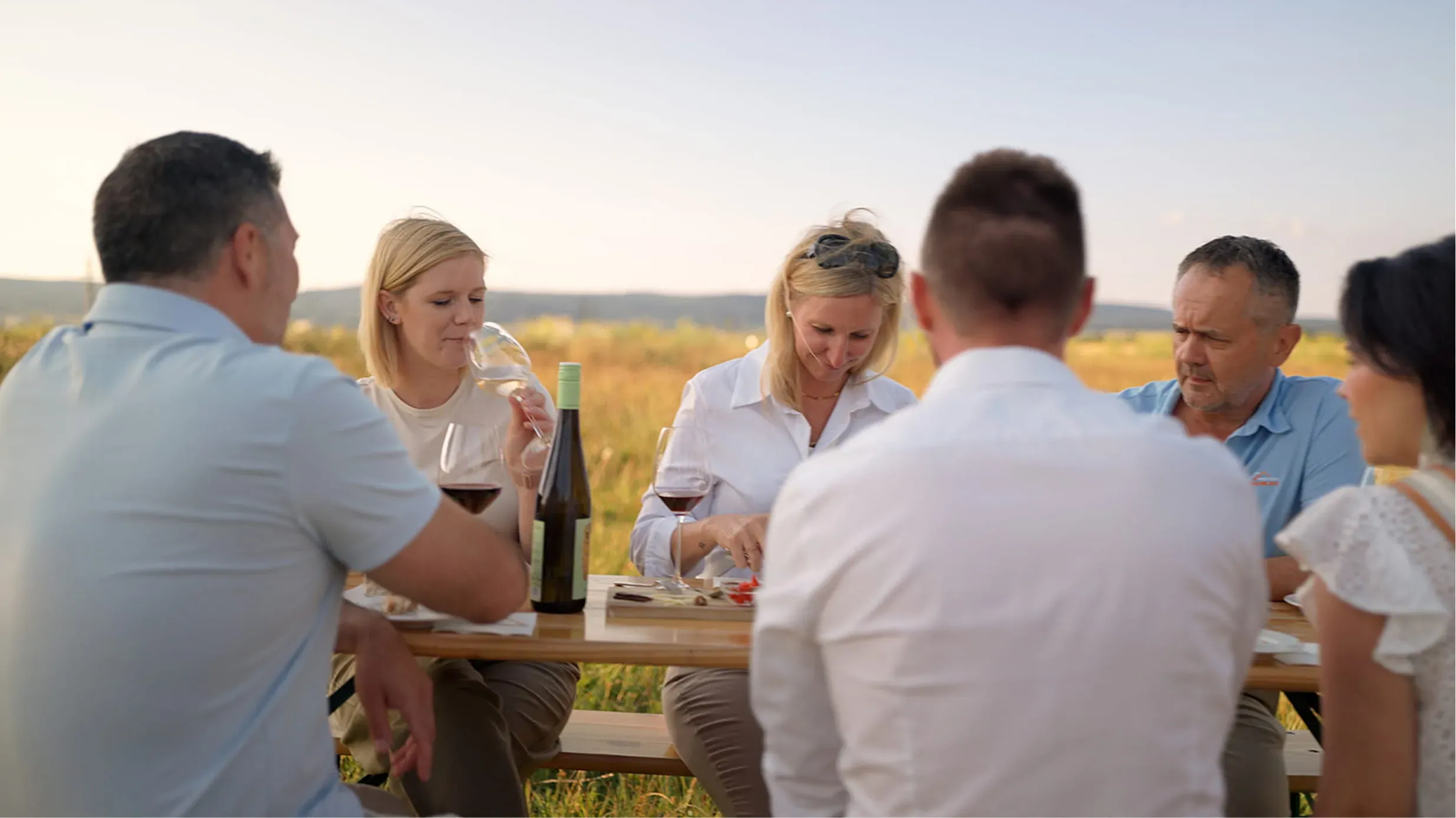 Friends gathered at an outdoor table